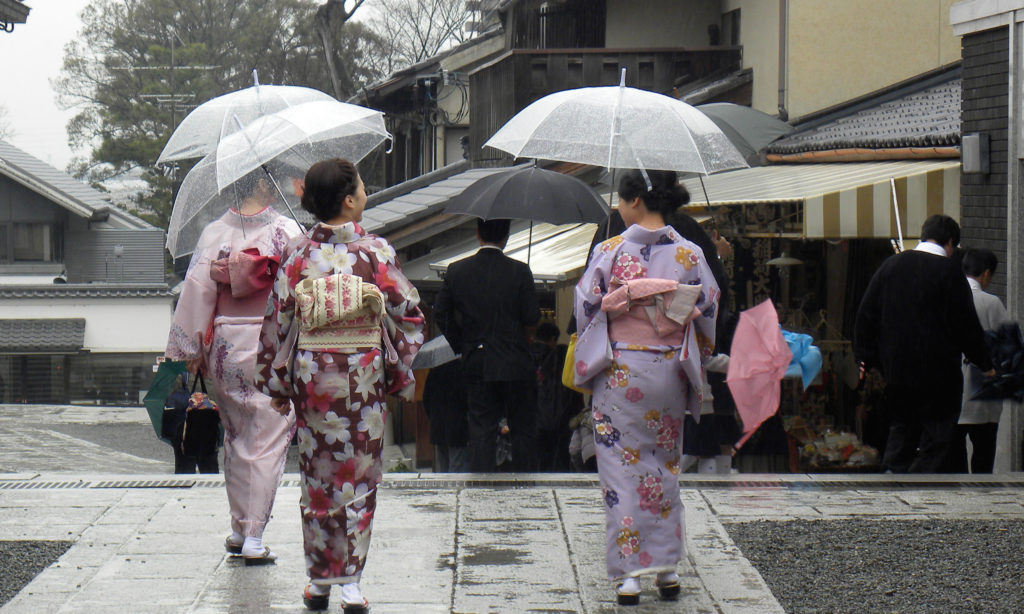 High School Japan women walking with umbrellas