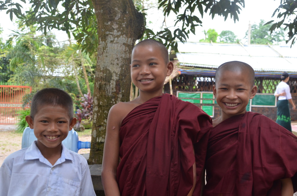 novice monks and a villager that study at the monastery school