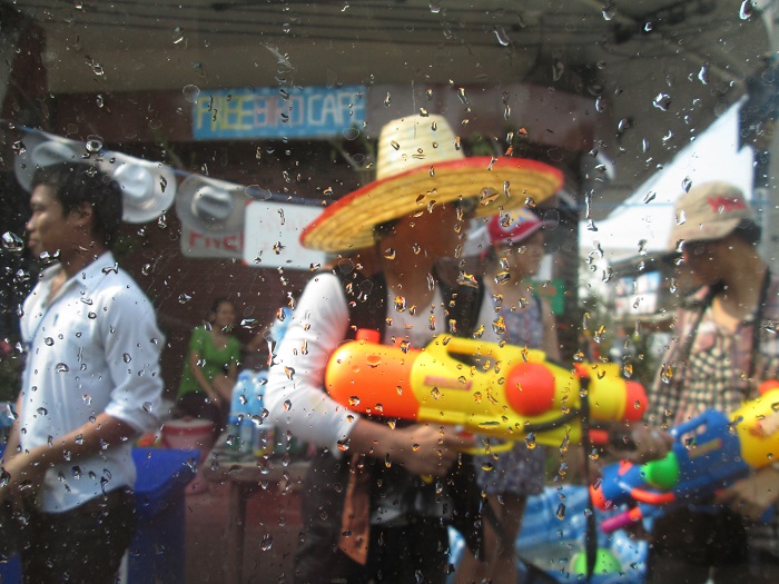 From the safety of the car - silly hats are another excellent part of Songkran.