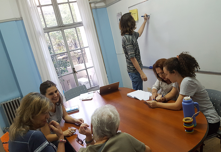 Adult students in a classroom in Argentina.