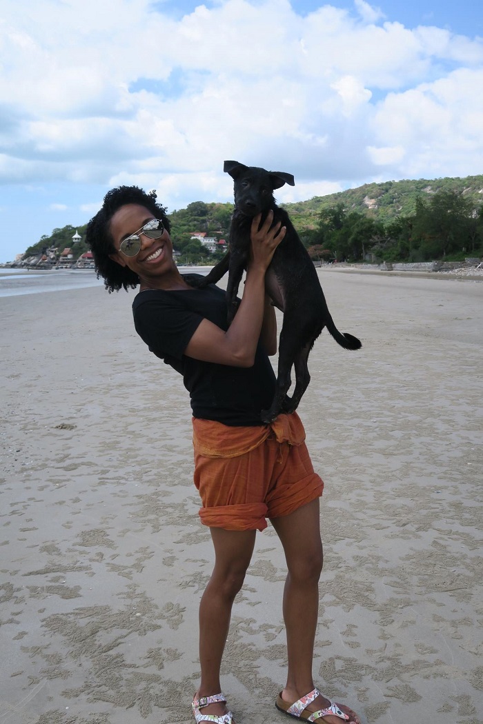 volunteer with dog on beach resize