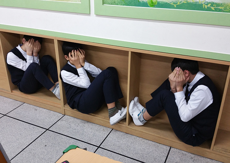 korean-boys-hiding-in-classroom