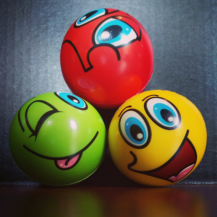 Small balls with faces.