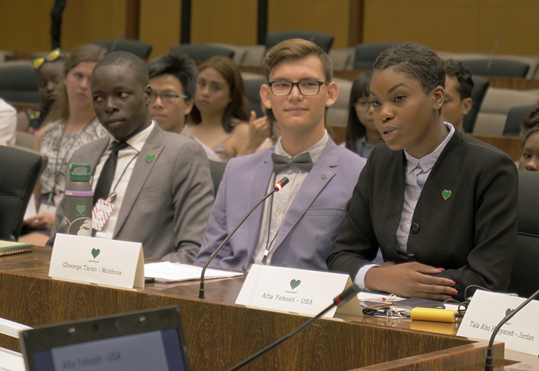 Afia Yeboah and other GGLC attendees presenting at the Department of State.