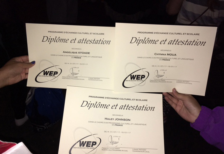 Diplomas for graduating from a teen summer language course in France.