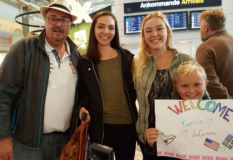 A Greenheart Traveler getting picked up at the airport by her host family. 