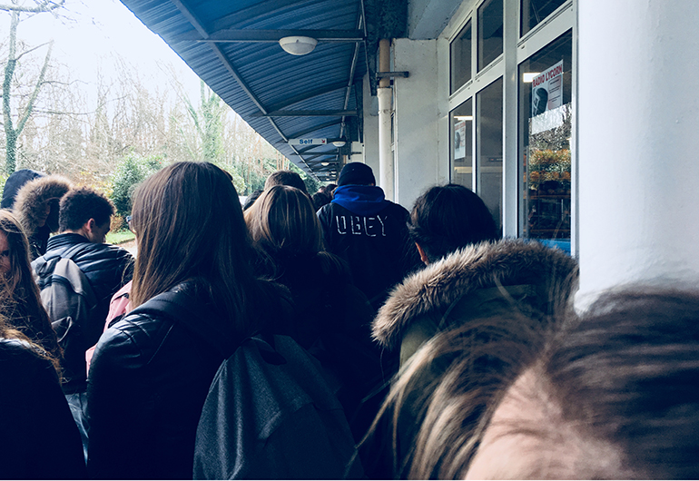 Waiting in line for lunch in France