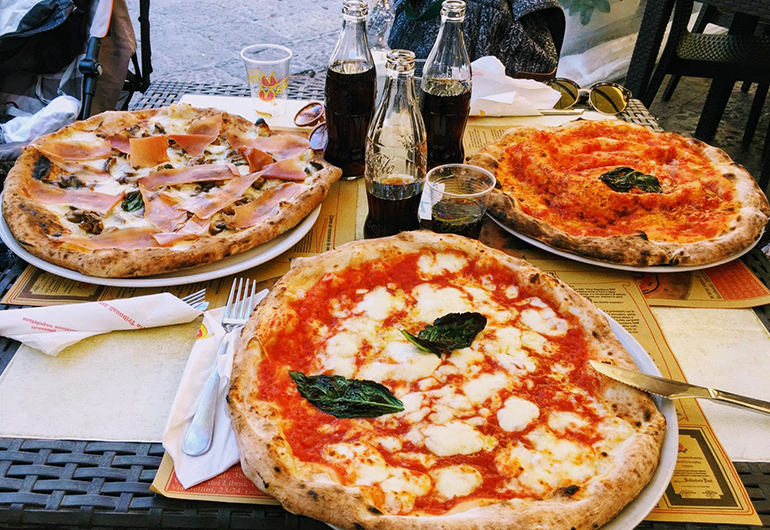 Three delicious pizzas from Naples, Italy.
