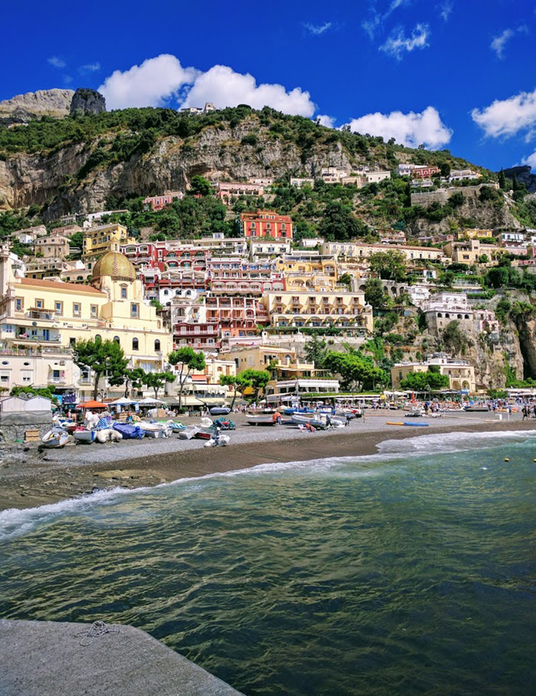 The coastline and colorful buildings in Positano, Italy on the Amalfi Coast.