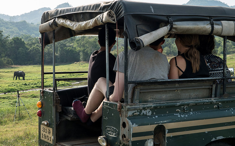 Volunteers in the back of a truck in Sri Lanka.