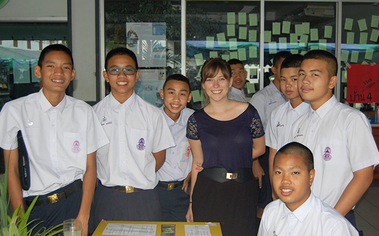 A foreign English teacher with students in Thailand.