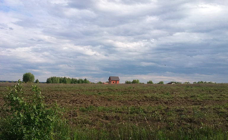 A farmhouse in Russian countryside.