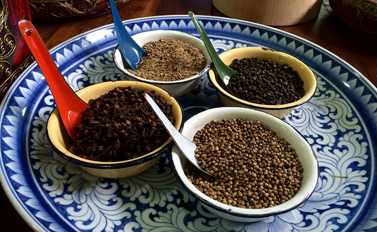 As assortment of spices in dishes.